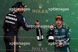 (L to R): Second placed Lewis Hamilton (GBR) Mercedes AMG F1 celebrates on the podium with third placed Fernando Alonso (ESP) Aston Martin F1 Team. 02.04.2023. Formula 1 World Championship, Rd 3, Australian Grand Prix, Albert Park, Melbourne, Australia, Race Day.