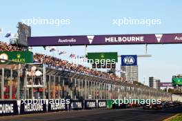 Max Verstappen (NLD) Red Bull Racing RB19 and Lewis Hamilton (GBR) Mercedes AMG F1 W14 at the second restart of the race. 02.04.2023. Formula 1 World Championship, Rd 3, Australian Grand Prix, Albert Park, Melbourne, Australia, Race Day.