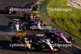 (L to R): Lando Norris (GBR) McLaren MCL60; Nico Hulkenberg (GER) Haas VF-23; and Pierre Gasly (FRA) Alpine F1 Team A523 at the second restart of the race. 02.04.2023. Formula 1 World Championship, Rd 3, Australian Grand Prix, Albert Park, Melbourne, Australia, Race Day.