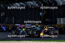 (L to R): Lewis Hamilton (GBR) Mercedes AMG F1 W14 and Max Verstappen (NLD) Red Bull Racing RB19 battle for position at the start of the race. 02.04.2023. Formula 1 World Championship, Rd 3, Australian Grand Prix, Albert Park, Melbourne, Australia, Race Day.