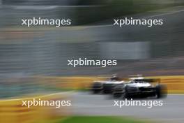 George Russell (GBR) Mercedes AMG F1 W14 leads Nyck de Vries (NLD) AlphaTauri AT04. 01.04.2023. Formula 1 World Championship, Rd 3, Australian Grand Prix, Albert Park, Melbourne, Australia, Qualifying Day.