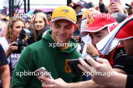 Oscar Piastri (AUS) McLaren with fans. 30.03.2023. Formula 1 World Championship, Rd 3, Australian Grand Prix, Albert Park, Melbourne, Australia, Preparation Day.
