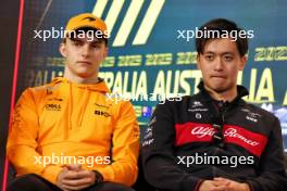 (L to R): Oscar Piastri (AUS) McLaren, and Zhou Guanyu (CHN) Alfa Romeo F1 Team, in the FIA Press Conference. 30.03.2023. Formula 1 World Championship, Rd 3, Australian Grand Prix, Albert Park, Melbourne, Australia, Preparation Day.