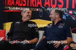 (L to R): Guenther Steiner (ITA) Haas F1 Team Prinicipal and Christian Horner (GBR) Red Bull Racing Team Principal in the FIA Press Conference. 30.06.2023. Formula 1 World Championship, Rd 10, Austrian Grand Prix, Spielberg, Austria, Qualifying Day.