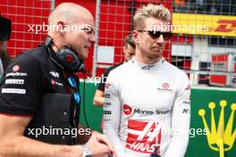 (L to R): Gary Gannon (GBR) Haas F1 Team Race Engineer with Nico Hulkenberg (GER) Haas F1 Team on the grid. 02.07.2023. Formula 1 World Championship, Rd 10, Austrian Grand Prix, Spielberg, Austria, Race Day.