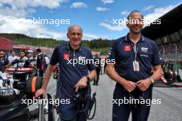 (L to R): Franz Tost (AUT) AlphaTauri Team Principal with Peter Bayer, AlphaTauri Chief Executive Officer on the grid. 02.07.2023. Formula 1 World Championship, Rd 10, Austrian Grand Prix, Spielberg, Austria, Race Day.