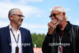 (L to R): Stefano Domenicali (ITA) Formula One President and CEO with Flavio Briatore (ITA) og. 02.07.2023. Formula 1 World Championship, Rd 10, Austrian Grand Prix, Spielberg, Austria, Race Day.