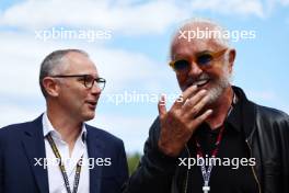(L to R): Stefano Domenicali (ITA) Formula One President and CEO with Flavio Briatore (ITA) og. 02.07.2023. Formula 1 World Championship, Rd 10, Austrian Grand Prix, Spielberg, Austria, Race Day.