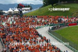 Circuit atmosphere - fans invade the circuit at the end of the race. 02.07.2023. Formula 1 World Championship, Rd 10, Austrian Grand Prix, Spielberg, Austria, Race Day.