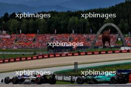 Alexander Albon (THA) Williams Racing FW45 and Kevin Magnussen (DEN) Haas VF-23 battle for position. 02.07.2023. Formula 1 World Championship, Rd 10, Austrian Grand Prix, Spielberg, Austria, Race Day.