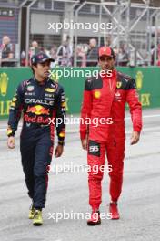 (L to R): Sergio Perez (MEX) Red Bull Racing and Carlos Sainz Jr (ESP) Ferrari in parc ferme. 01.07.2023. Formula 1 World Championship, Rd 10, Austrian Grand Prix, Spielberg, Austria, Sprint Day.