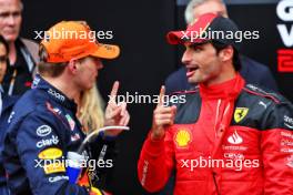 (L to R): race winner Max Verstappen (NLD) Red Bull Racing with third placed Carlos Sainz Jr (ESP) Ferrari in parc ferme. 01.07.2023. Formula 1 World Championship, Rd 10, Austrian Grand Prix, Spielberg, Austria, Sprint Day.