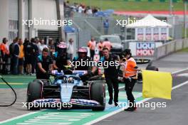 Alpine F1 Team mechanics in the pits fetch Pierre Gasly (FRA) Alpine F1 Team A523. 01.07.2023. Formula 1 World Championship, Rd 10, Austrian Grand Prix, Spielberg, Austria, Sprint Day.