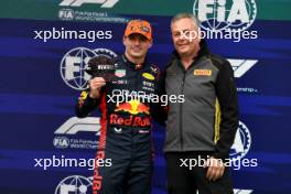 (L to R): Max Verstappen (NLD) Red Bull Racing celebrates securing the first grid position for Sprint in parc ferme with Mario Isola (ITA) Pirelli Racing Manager. 01.07.2023. Formula 1 World Championship, Rd 10, Austrian Grand Prix, Spielberg, Austria, Sprint Day.