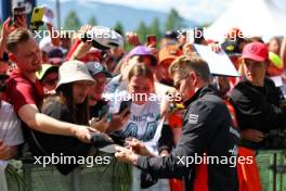 Nico Hulkenberg (GER) Haas F1 Team with fans. 02.07.2023. Formula 1 World Championship, Rd 10, Austrian Grand Prix, Spielberg, Austria, Race Day.
