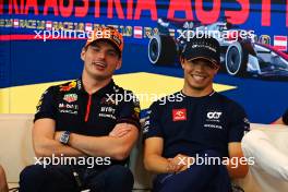 (L to R): Max Verstappen (NLD) Red Bull Racing and Nyck de Vries (NLD) AlphaTauri in the FIA Press Conference. 29.06.2023. Formula 1 World Championship, Rd 10, Austrian Grand Prix, Spielberg, Austria, Preparation Day.
