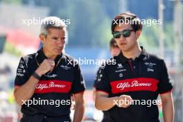 Zhou Guanyu (CHN) Alfa Romeo F1 Team walks the circuit with Xevi Pujolar (ESP) Alfa Romeo F1 Team Head of Trackside Engineering. 29.06.2023. Formula 1 World Championship, Rd 10, Austrian Grand Prix, Spielberg, Austria, Preparation Day.