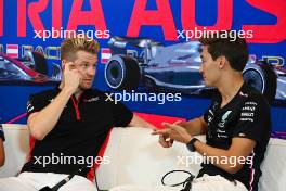 (L to R): Nico Hulkenberg (GER) Haas F1 Team and George Russell (GBR) Mercedes AMG F1 in the FIA Press Conference. 29.06.2023. Formula 1 World Championship, Rd 10, Austrian Grand Prix, Spielberg, Austria, Preparation Day.