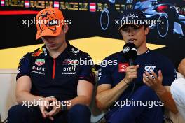 (L to R): Max Verstappen (NLD) Red Bull Racing and Nyck de Vries (NLD) AlphaTauri in the FIA Press Conference. 29.06.2023. Formula 1 World Championship, Rd 10, Austrian Grand Prix, Spielberg, Austria, Preparation Day.