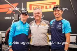 (L to R): Logan Sargeant (USA) Williams Racing with Mario Isola (ITA) Pirelli Racing Manager and Alexander Albon (THA) Williams Racing. 29.06.2023. Formula 1 World Championship, Rd 10, Austrian Grand Prix, Spielberg, Austria, Preparation Day.