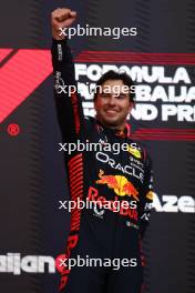 Race winner Sergio Perez (MEX) Red Bull Racing celebrates on the podium. 30.04.2023. Formula 1 World Championship, Rd 4, Azerbaijan Grand Prix, Baku Street Circuit, Azerbaijan, Race Day.