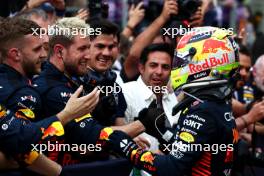 Race winner Sergio Perez (MEX) Red Bull Racing celebrates with the team in parc ferme. 30.04.2023. Formula 1 World Championship, Rd 4, Azerbaijan Grand Prix, Baku Street Circuit, Azerbaijan, Race Day.