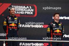 (L to R): Race winner Sergio Perez (MEX) Red Bull Racing with second placed team mate Max Verstappen (NLD) Red Bull Racing on the podium. 30.04.2023. Formula 1 World Championship, Rd 4, Azerbaijan Grand Prix, Baku Street Circuit, Azerbaijan, Race Day.