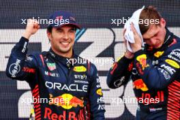 (L to R): Race winner Sergio Perez (MEX) Red Bull Racing celebrates on the podium with second placed team mate Max Verstappen (NLD) Red Bull Racing. 30.04.2023. Formula 1 World Championship, Rd 4, Azerbaijan Grand Prix, Baku Street Circuit, Azerbaijan, Race Day.