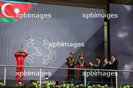 (L to R): Charles Leclerc (MON) Ferrari; Max Verstappen (NLD) Red Bull Racing; and race winner Sergio Perez (MEX) Red Bull Racing, on the podium. 30.04.2023. Formula 1 World Championship, Rd 4, Azerbaijan Grand Prix, Baku Street Circuit, Azerbaijan, Race Day.