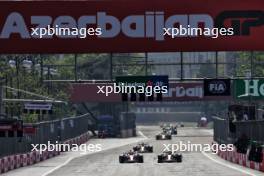 Charles Leclerc (MON) Ferrari SF-23 and Max Verstappen (NLD) Red Bull Racing RB19 battle for the lead of the race. 30.04.2023. Formula 1 World Championship, Rd 4, Azerbaijan Grand Prix, Baku Street Circuit, Azerbaijan, Race Day.