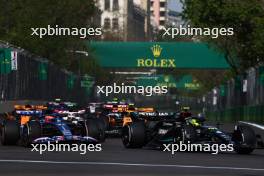 (L to R): Esteban Ocon (FRA) Alpine F1 Team A523 and Lewis Hamilton (GBR) Mercedes AMG F1 W14 battle for position. 30.04.2023. Formula 1 World Championship, Rd 4, Azerbaijan Grand Prix, Baku Street Circuit, Azerbaijan, Race Day.