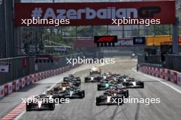 Charles Leclerc (MON) Ferrari SF-23 leads at the start of the race. 30.04.2023. Formula 1 World Championship, Rd 4, Azerbaijan Grand Prix, Baku Street Circuit, Azerbaijan, Race Day.