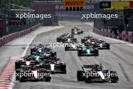 (L to R): Charles Leclerc (MON) Ferrari SF-23 and Sergio Perez (MEX) Red Bull Racing RB19 battle for the lead of the race. 30.04.2023. Formula 1 World Championship, Rd 4, Azerbaijan Grand Prix, Baku Street Circuit, Azerbaijan, Race Day.