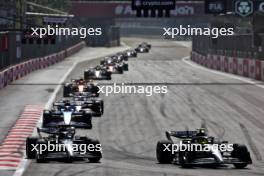 (L to R): George Russell (GBR) Mercedes AMG F1 W14 and Lewis Hamilton (GBR) Mercedes AMG F1 W14 battle for position. 30.04.2023. Formula 1 World Championship, Rd 4, Azerbaijan Grand Prix, Baku Street Circuit, Azerbaijan, Race Day.