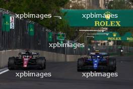 (L to R): Valtteri Bottas (FIN) Alfa Romeo F1 Team C43 and Logan Sargeant (USA) Williams Racing FW45 battle for position. 30.04.2023. Formula 1 World Championship, Rd 4, Azerbaijan Grand Prix, Baku Street Circuit, Azerbaijan, Race Day.