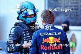 (L to R): George Russell (GBR) Mercedes AMG F1 and Max Verstappen (NLD) Red Bull Racing discuss the Sprint race in parc ferme. 29.04.2023. Formula 1 World Championship, Rd 4, Azerbaijan Grand Prix, Baku Street Circuit, Azerbaijan, Sprint Day.