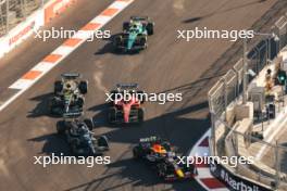 Max Verstappen (NLD) Red Bull Racing RB19 and George Russell (GBR) Mercedes AMG F1 W14 battle for position. 29.04.2023. Formula 1 World Championship, Rd 4, Azerbaijan Grand Prix, Baku Street Circuit, Azerbaijan, Sprint Day.