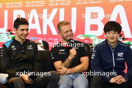 (L to R): Esteban Ocon (FRA) Alpine F1 Team; Kevin Magnussen (DEN) Haas F1 Team; and Yuki Tsunoda (JPN) AlphaTauri in the FIA Press Conference. 27.04.2023. Formula 1 World Championship, Rd 4, Azerbaijan Grand Prix, Baku Street Circuit, Azerbaijan, Preparation Day.
