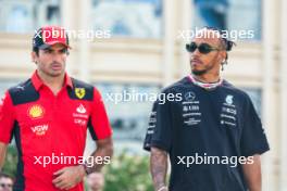 (L to R): Carlos Sainz Jr (ESP) Ferrari with Lewis Hamilton (GBR) Mercedes AMG F1. 27.04.2023. Formula 1 World Championship, Rd 4, Azerbaijan Grand Prix, Baku Street Circuit, Azerbaijan, Preparation Day.