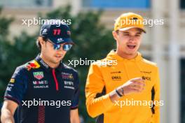 (L to R): Sergio Perez (MEX) Red Bull Racing with Lando Norris (GBR) McLaren. 27.04.2023. Formula 1 World Championship, Rd 4, Azerbaijan Grand Prix, Baku Street Circuit, Azerbaijan, Preparation Day.