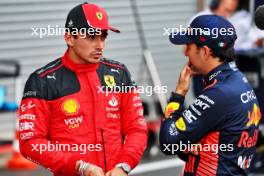 (L to R): Charles Leclerc (MON) Ferrari with Sergio Perez (MEX) Red Bull Racing in qualifying parc ferme. 28.07.2023. Formula 1 World Championship, Rd 13, Belgian Grand Prix, Spa Francorchamps, Belgium, Qualifying Day.