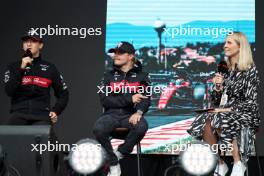 (L to R): Zhou Guanyu (CHN) Alfa Romeo F1 Team with Valtteri Bottas (FIN) Alfa Romeo F1 Team and Rosanna Tennant (GBR) F1 Presenter on the FanZone Stage. 28.07.2023. Formula 1 World Championship, Rd 13, Belgian Grand Prix, Spa Francorchamps, Belgium, Qualifying Day.