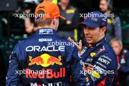 (L to R): Pole sitter Max Verstappen (NLD) Red Bull Racing in qualifying parc ferme with third placed team mate Sergio Perez (MEX) Red Bull Racing. 28.07.2023. Formula 1 World Championship, Rd 13, Belgian Grand Prix, Spa Francorchamps, Belgium, Qualifying Day.