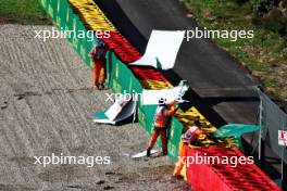 Marshals clear away the damaged Rolex branding during qualifying. 28.07.2023. Formula 1 World Championship, Rd 13, Belgian Grand Prix, Spa Francorchamps, Belgium, Qualifying Day.