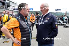 (L to R): Zak Brown (USA) McLaren Executive Director with Dr Helmut Marko (AUT) Red Bull Motorsport Consultant on the grid. 30.07.2023. Formula 1 World Championship, Rd 13, Belgian Grand Prix, Spa Francorchamps, Belgium, Race Day.