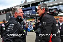 (L to R): Otmar Szafnauer (USA) Alpine F1 Team, Team Principal with Guenther Steiner (ITA) Haas F1 Team Prinicipal on the grid. 30.07.2023. Formula 1 World Championship, Rd 13, Belgian Grand Prix, Spa Francorchamps, Belgium, Race Day.
