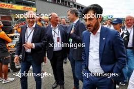 Mohammed Bin Sulayem (UAE) FIA President with Stefano Domenicali (ITA) Formula One President and CEO on the grid. 30.07.2023. Formula 1 World Championship, Rd 13, Belgian Grand Prix, Spa Francorchamps, Belgium, Race Day.