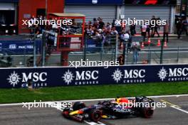 Race winner Max Verstappen (NLD) Red Bull Racing RB19 takes the chequered flag at the end of the race. 30.07.2023. Formula 1 World Championship, Rd 13, Belgian Grand Prix, Spa Francorchamps, Belgium, Race Day.