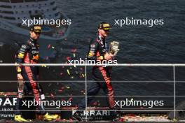 (L to R): Sergio Perez (MEX) Red Bull Racing and race winner Max Verstappen (NLD) Red Bull Racing on the podium. 30.07.2023. Formula 1 World Championship, Rd 13, Belgian Grand Prix, Spa Francorchamps, Belgium, Race Day.