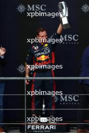 Greg Reeson (GBR) Red Bull Racing Tyre Technician celebrates on the podium. 30.07.2023. Formula 1 World Championship, Rd 13, Belgian Grand Prix, Spa Francorchamps, Belgium, Race Day.